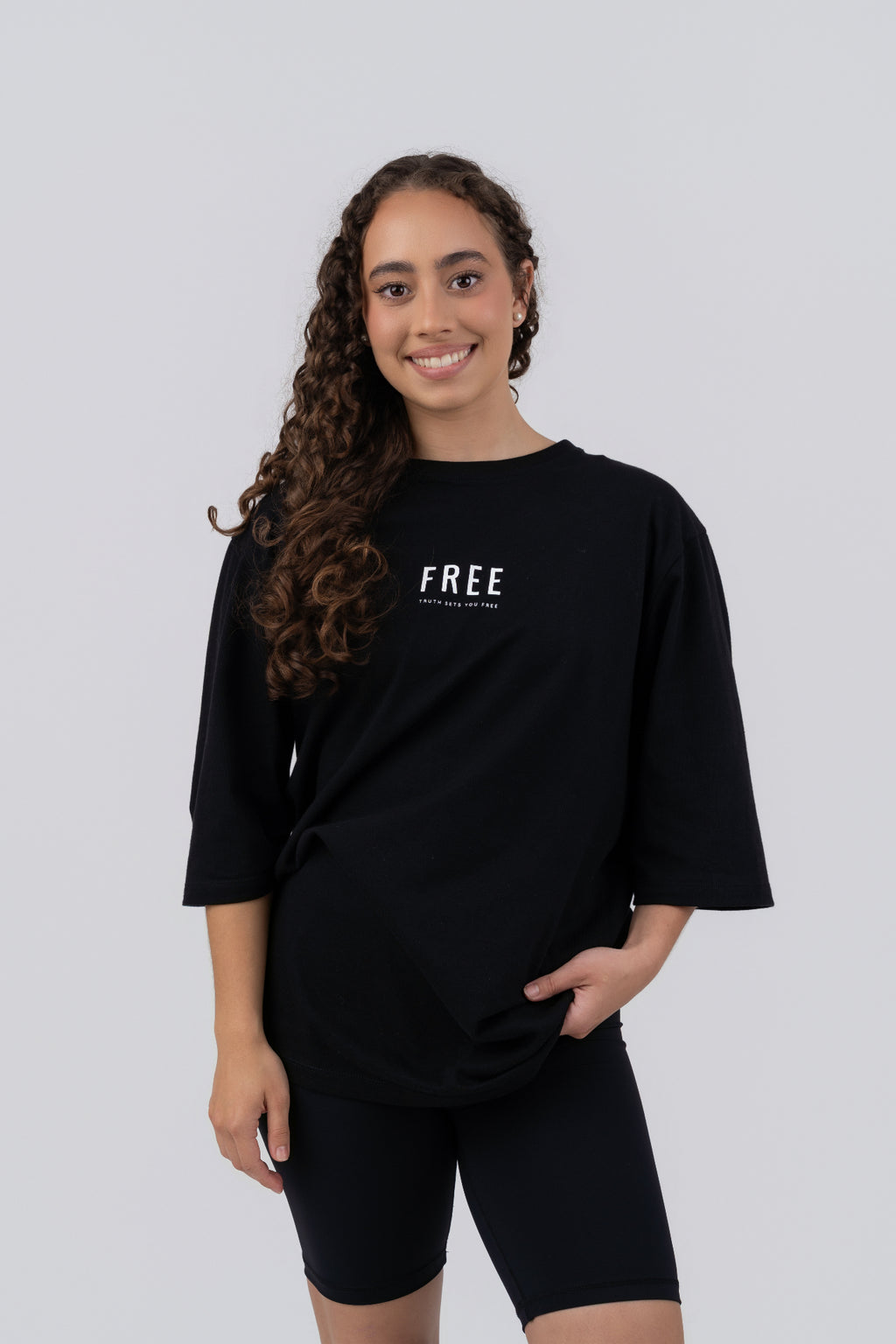 FREE Oversized T-Shirt Black - front on model